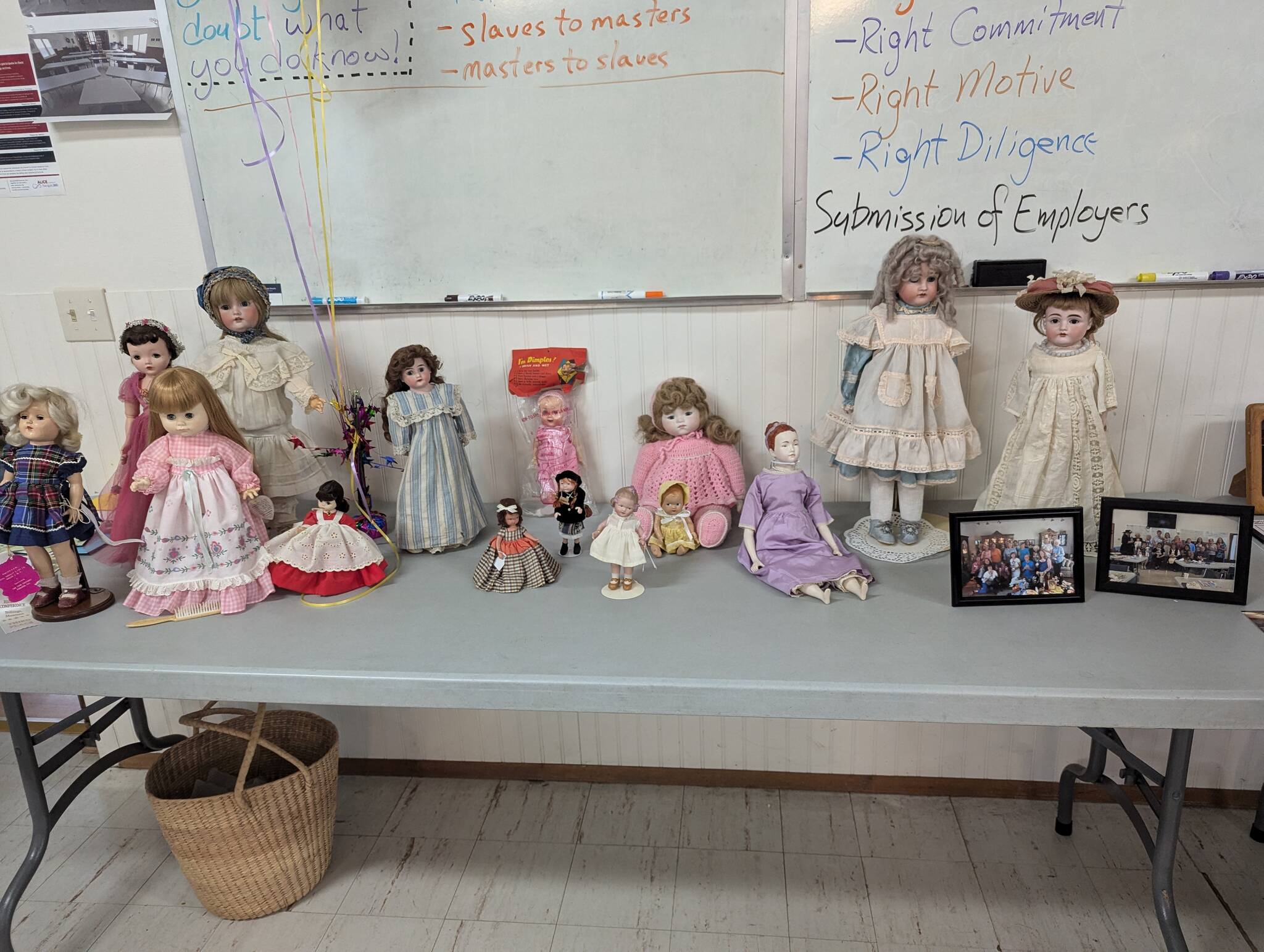 Olympic Peninsula Doll Club members display the first doll they got as a collector to share for show-and-tell.