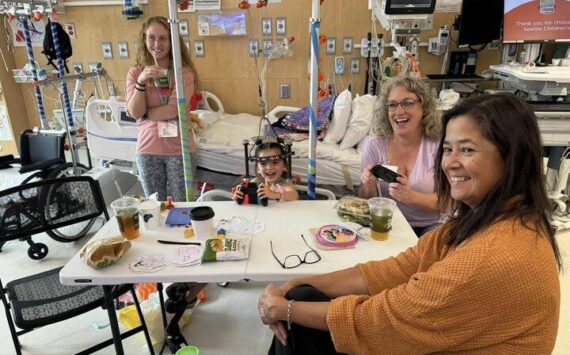 Photo by Sequim Picklers pickleball club / Members of the Sequim Picklers pickleball club Care Team help the Bo family as 5-year-old daughter Ellie gets treatment at Seattle Childrens’ Hospital. Pictured, at left, is Ellie’s mom Shauna.