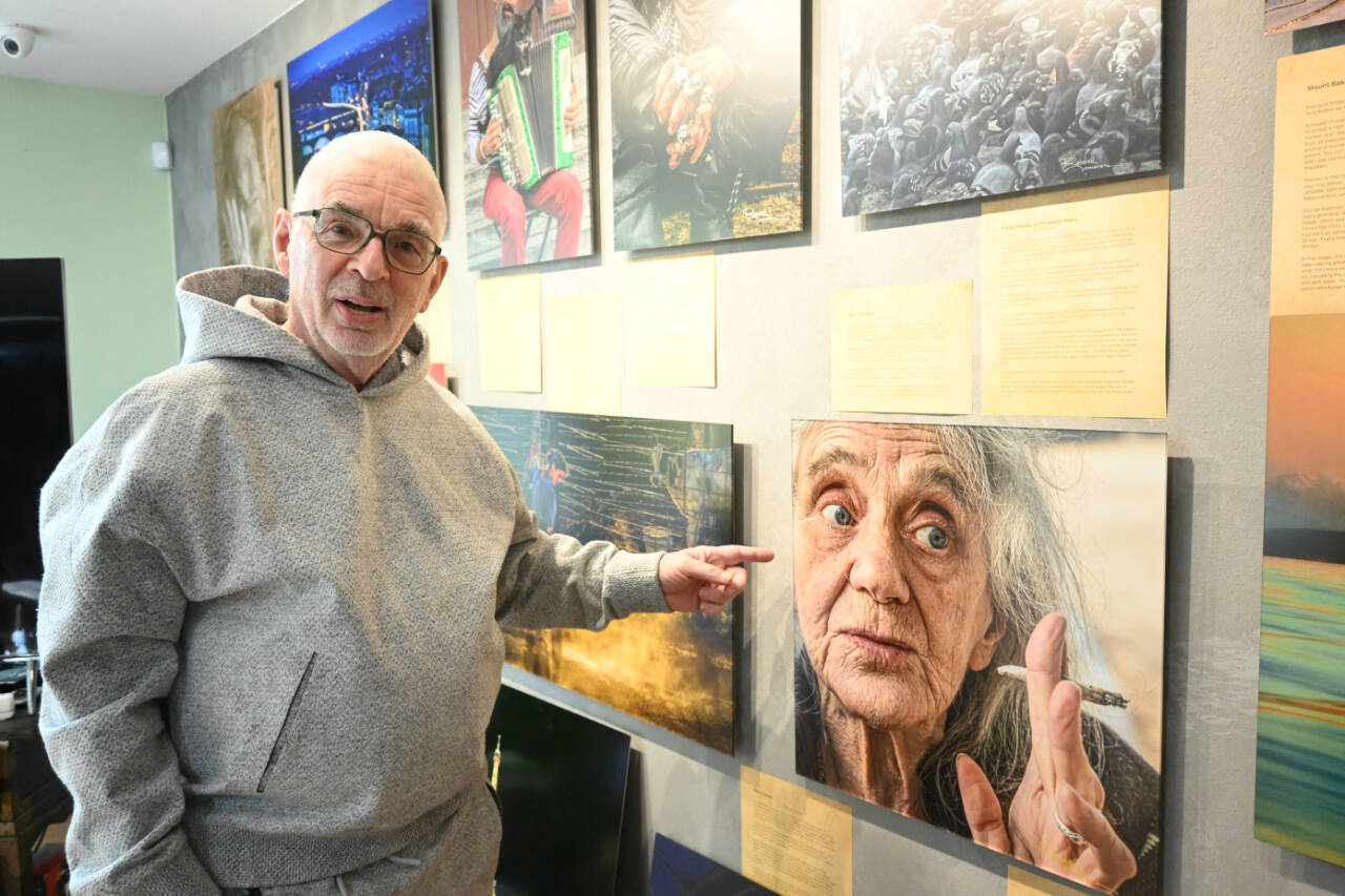 Sequim Gazette photo by Michael Dashiell / Sequim photographer Randy Tomaras points to a photo featured in his two-volume course “It Is NOT the Camera.” Tomaras’ home studio is featured in the upcoming Strait from the Artists Studio Tour, set for Nov. 9-10.