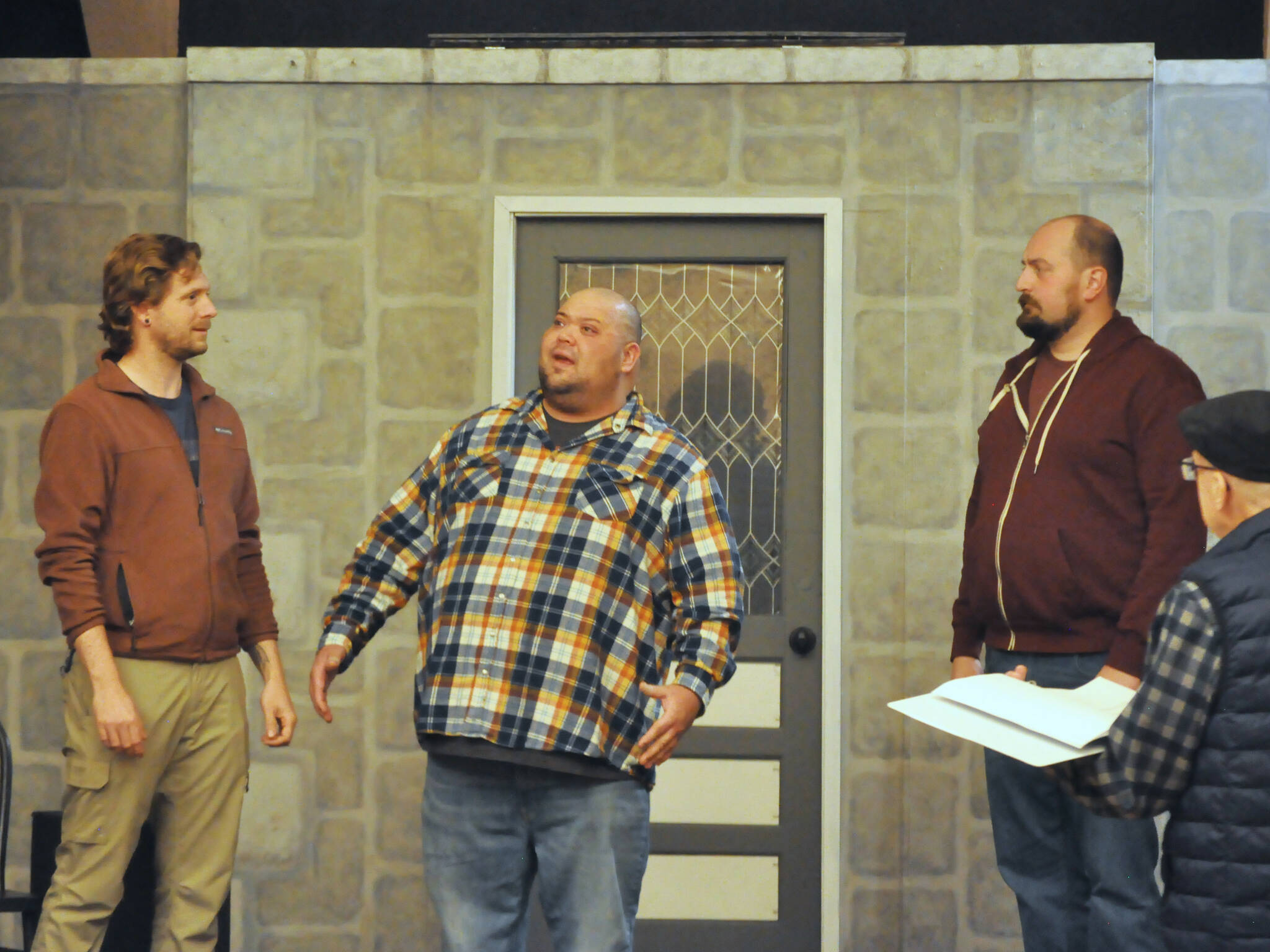 Sequim Gazette photo by Matthew Nash
Actors, from left, Justin Stapleton, Mario Arruda and Sean Stone rehearse “Artificial Emotions,” a short play written by John Painter and directed by Bill Stone, on far right. It’ll be the first of eight plays in Olympic Theatre Arts’ New Works Showcase from Nov. 15-24.