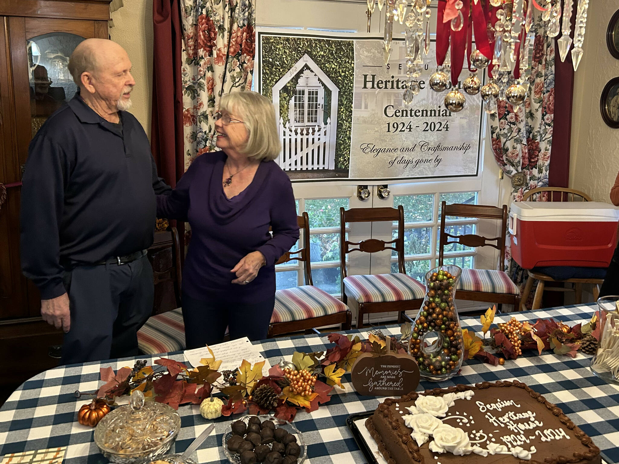 Don Palm and Winnie Greenaway-Palm celebrate Sequim Heritage House, 312 N. Second Ave., turning 100-years-old on Nov. 9. The home has been a vacation rental for seven years, but been maintained to be period-appropriate, said Greenaway-Palm.