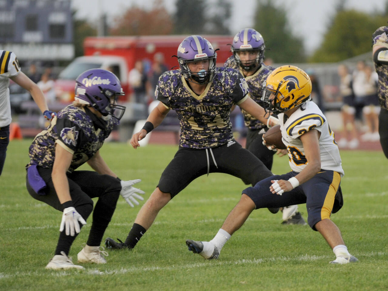 Sequim Gazette file photo by Michael Dashiell
Sequim’s Zeke Schmadeke, pictured readying to tackle a Forks runner earlier this season in Sequim, made the all-Olympic League first team as a defensive back.