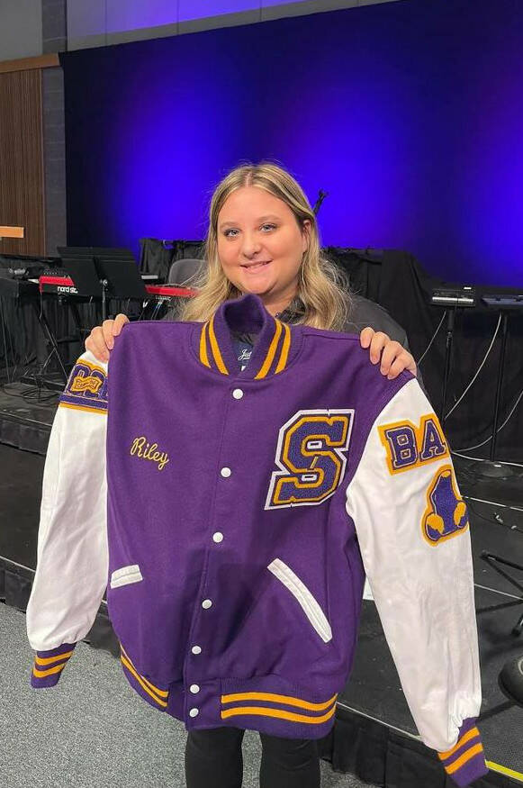 Photo courtesy Sarah Campbell
Sequim High School junior Riley Campbell received a Letterman jacket on Nov. 9 for her years of service volunteering with the Wolf Pack youth football and cheer program. She started in the organization in kindergarten.