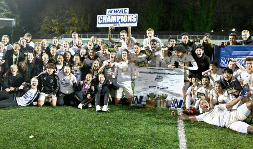 <p>Photo courtesy Peninsula College</p>
                                <p>The Peninsula College men’s and women’s soccer teams celebrate their dual championships Sunday (Nov. 17) in Tukwila after the men beat Clark College 3-0 in their finals match and the women won 1-0 over Bellevue.</p>