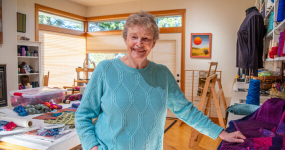 Sequim Gazette photos by Emily Matthiessen
Lynn Baritelle, pictured in her studio, is a weaver and fiber artist with more than 5 decades of experience. Her guild, the North Olympic Shuttle and Spindle Guild, will hold their textile sale, “Celebrating Color,” at Megan Cyphers’ Locally Known Cowork, 112 W. Washington Street in Sequim on Dec. 6 and 7.