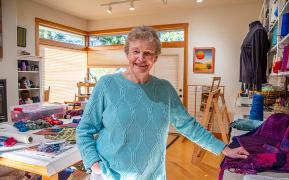 Sequim Gazette photos by Emily Matthiessen
Lynn Baritelle, pictured in her studio, is a weaver and fiber artist with more than 5 decades of experience. Her guild, the North Olympic Shuttle and Spindle Guild, will hold their textile sale, “Celebrating Color,” at Megan Cyphers’ Locally Known Cowork, 112 W. Washington Street in Sequim on Dec. 6 and 7.