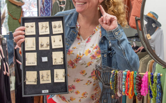 Sequim Gazette photos by Emily Matthiessen
Western Wanderer owner Carolee Edwards shares some of the Lizzie Betz jewelry by local artist Carol Pearson that she sells at her boutique.