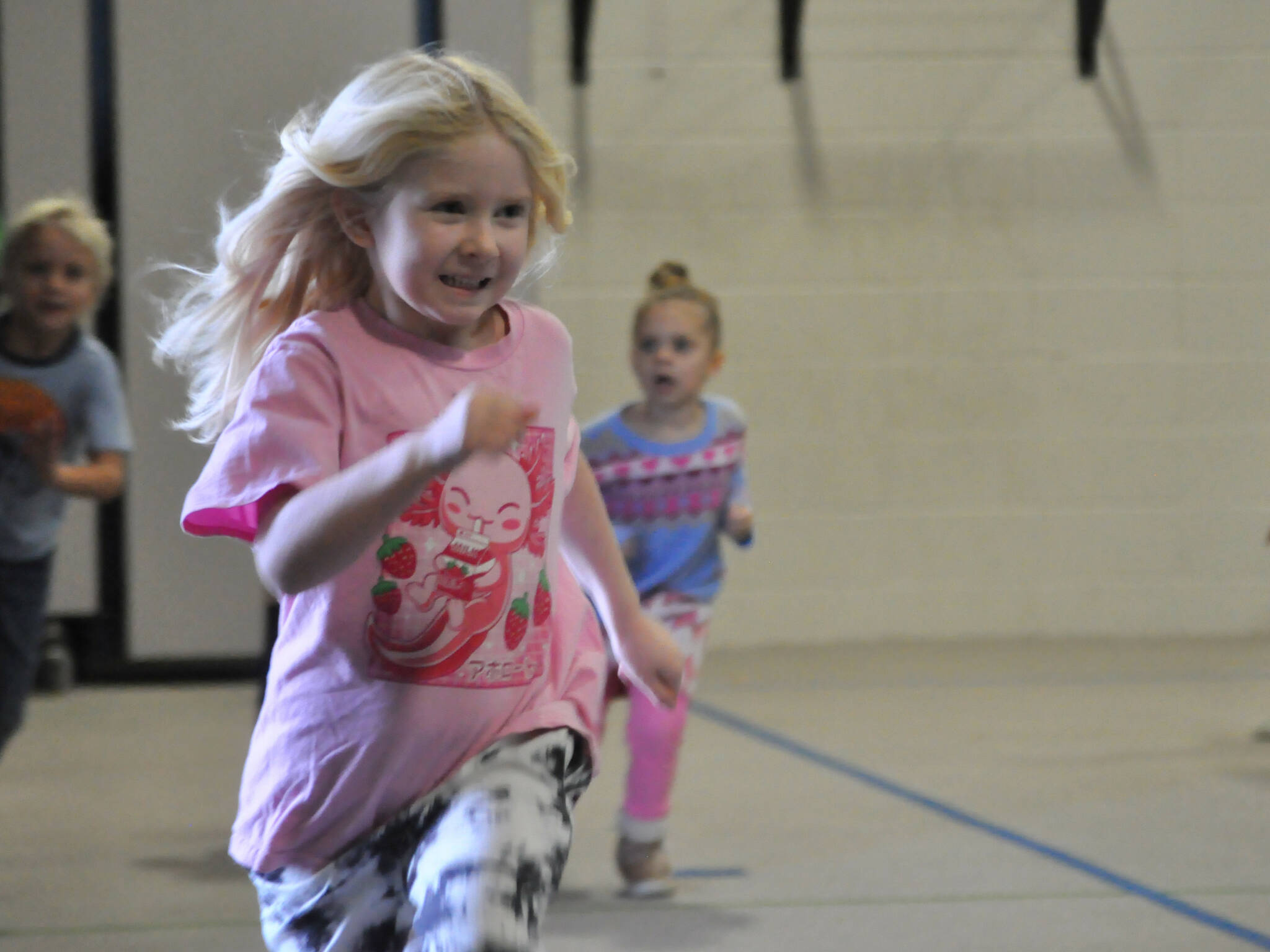 Sequim Gazette photos by Matthew Nash
Kindergartener Mary Wakefield runs a lap during Sequim Elementary PTA’s Turkey Trot in Greywolf Elementary School’s gym.