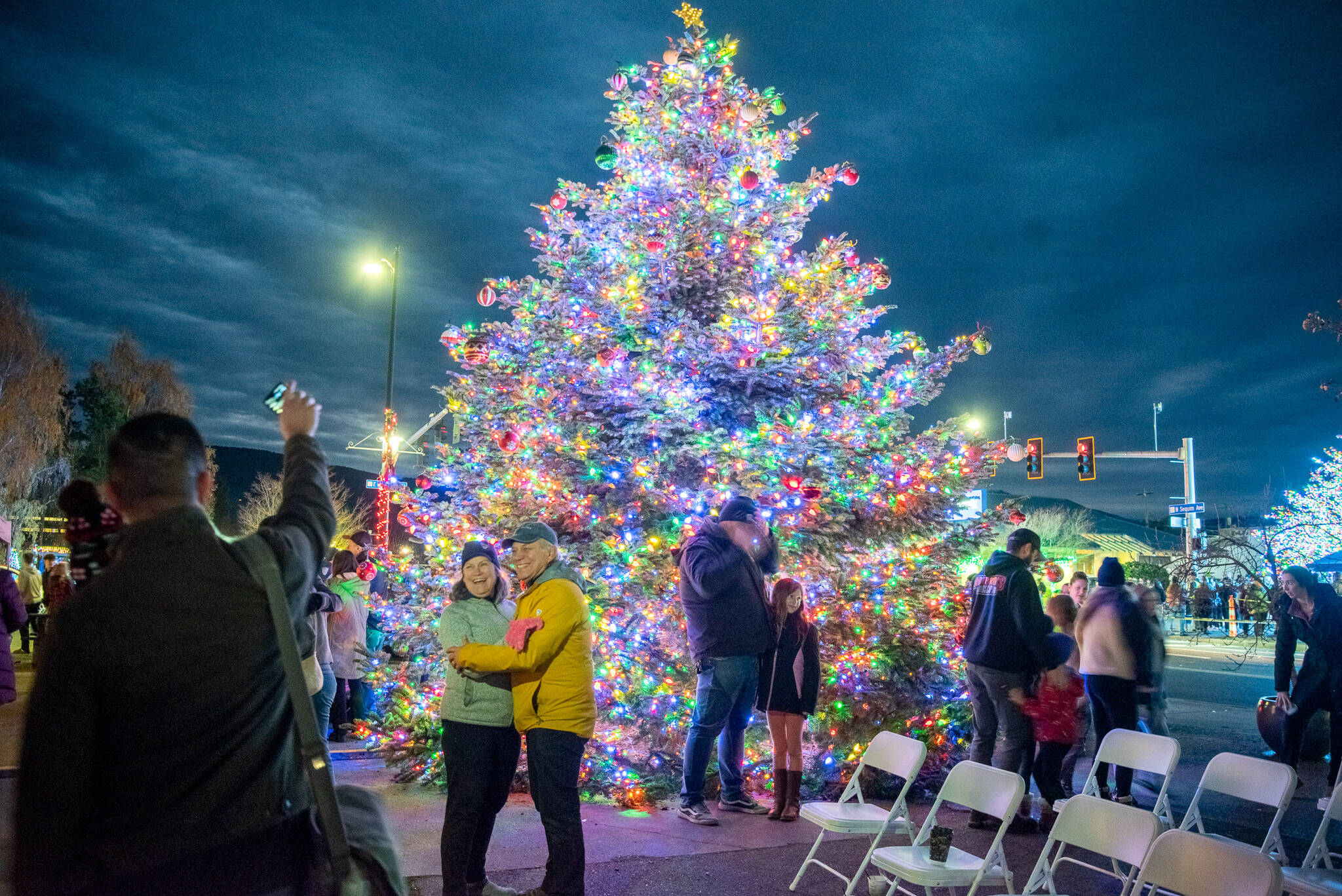 After the Lighted Tractor Cruise, the Hometown Holidays crowd took time to greet their neighbors and pose for a few more pictures on Nov. 30 in downtown Sequim.
Sequim Gazette photo by Emily Matthiessen