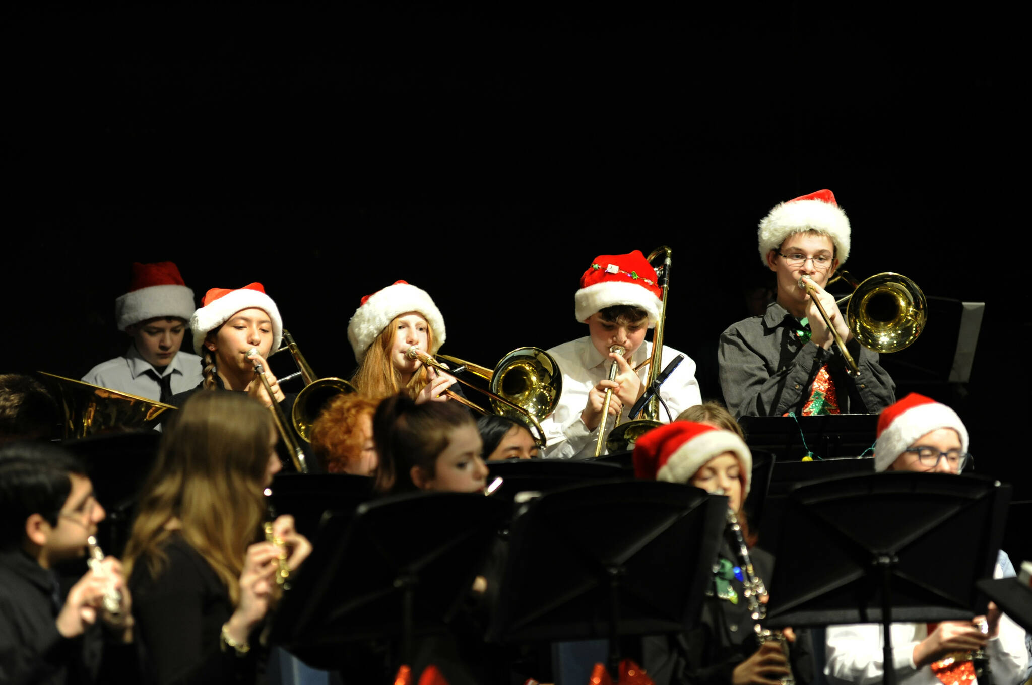 Sequim Gazette photos by Matthew Nash
Sequim Middle School trombone players, from left, Sophia Pritchard, Arabella Marco, Stone McClurken, and Max Brouillard play a portion of “Jingle Bell Rock” during the All Bands Concert on Dec. 19. The four musicians are part of Sequim Middle School’s Intermediate Band.