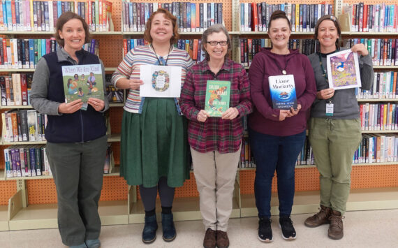 Photo courtesy North Olympic Library System/ Staff with the Sequim Library, from left, Public Services Specialists Amber Kleefeld, Anna Foster and Ellen Schvetz, Public Services Lead Annie Brooker and Youth Services Librarian Charlotte McGrew, provide some of their favorite reads for 2024. Not pictured are Older Adult Services Librarian Corrina Desmarais and Public Services Specialist Dana Seevers.