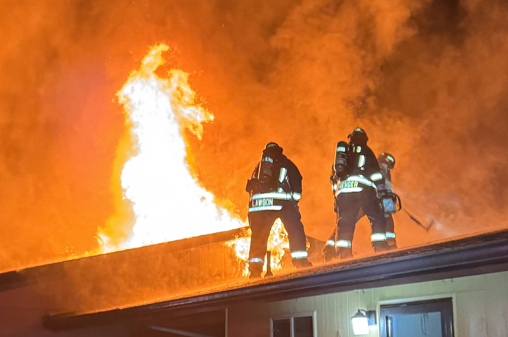 Photo courtesy Beau Sylte, CCFD3
Clallam County Fire District 3 firefighters look to contain a fire in 2024. Calls for fires were down last year, but general calls for service were up from 2023.