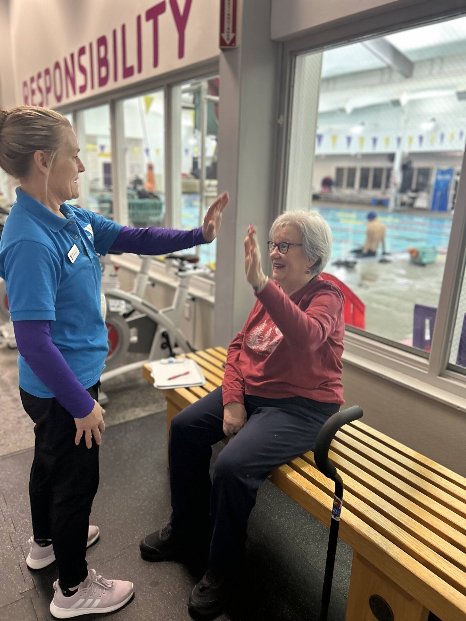 Sequim Gazette Photo by Kathy Cruz 
Molly Schwarz gives trainer Lisa Fox a high five as one of the exercises they do together during their twice-weekly sessions.