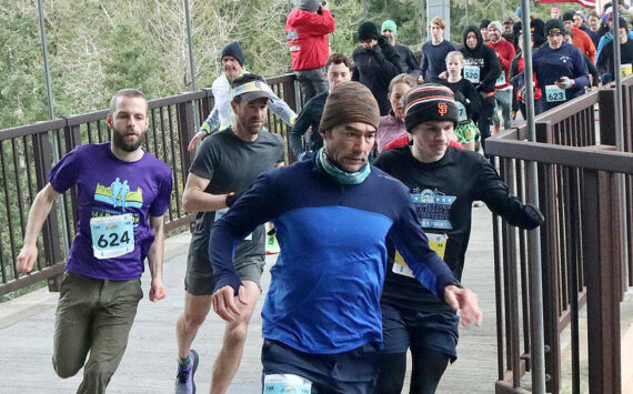 Perhaps a better start of the race shot. The eventual winner is the fellow with the SF cap named Kyle Bardwell. And directly behind him in pink is the eventual female winner Sarah Paquet. dlogan